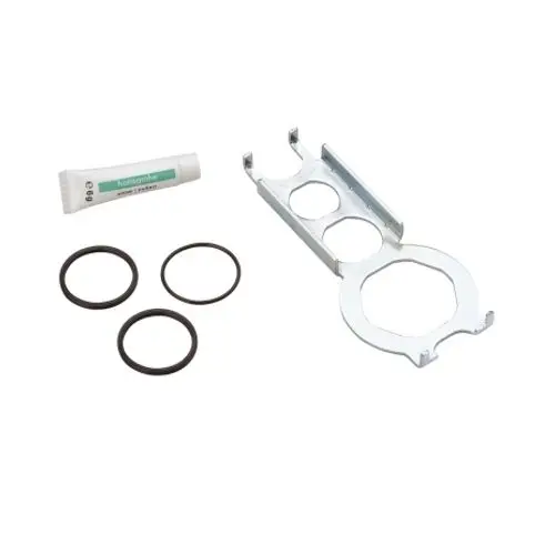 Dichtungsset von Hansgrohe mit einer Halterung und drei O-Ringen sowie einer Tube Dichtmittel, geeignet für Installationen.